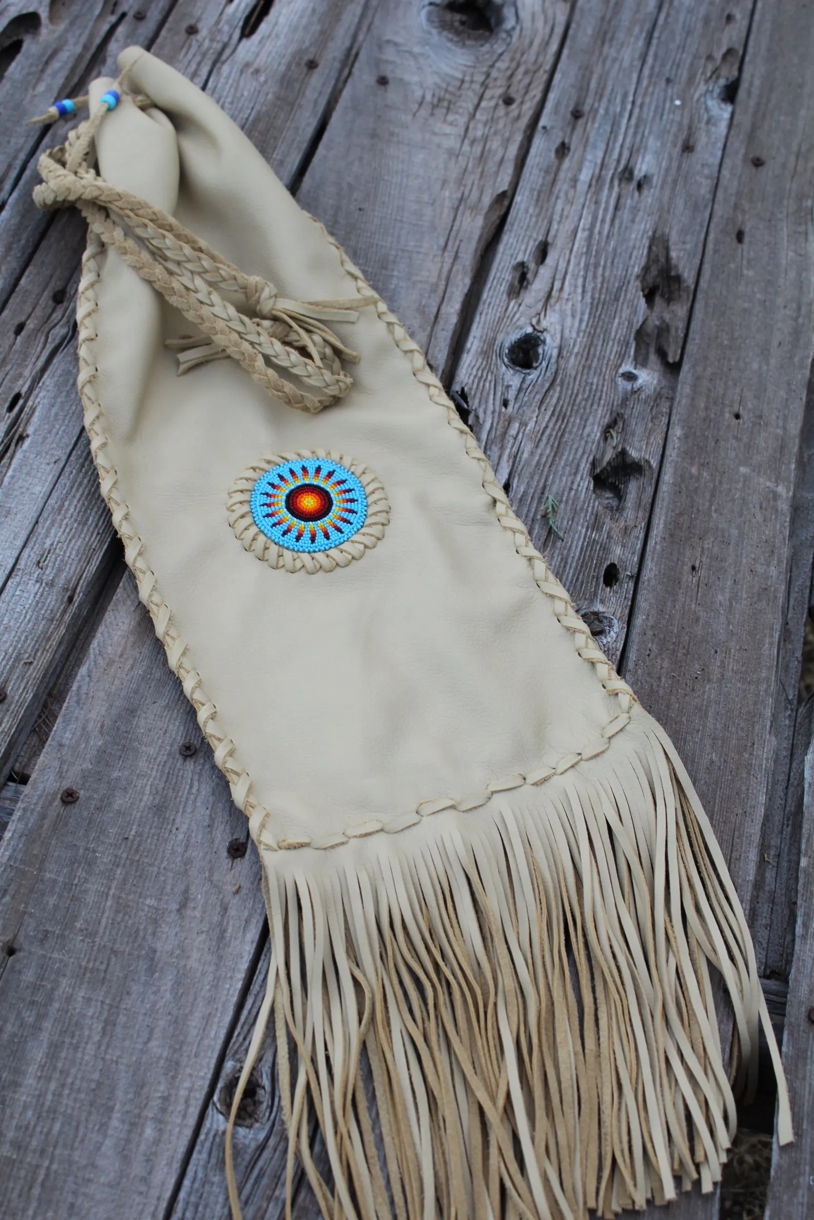 Beaded pipe bag, leather chanupa bag