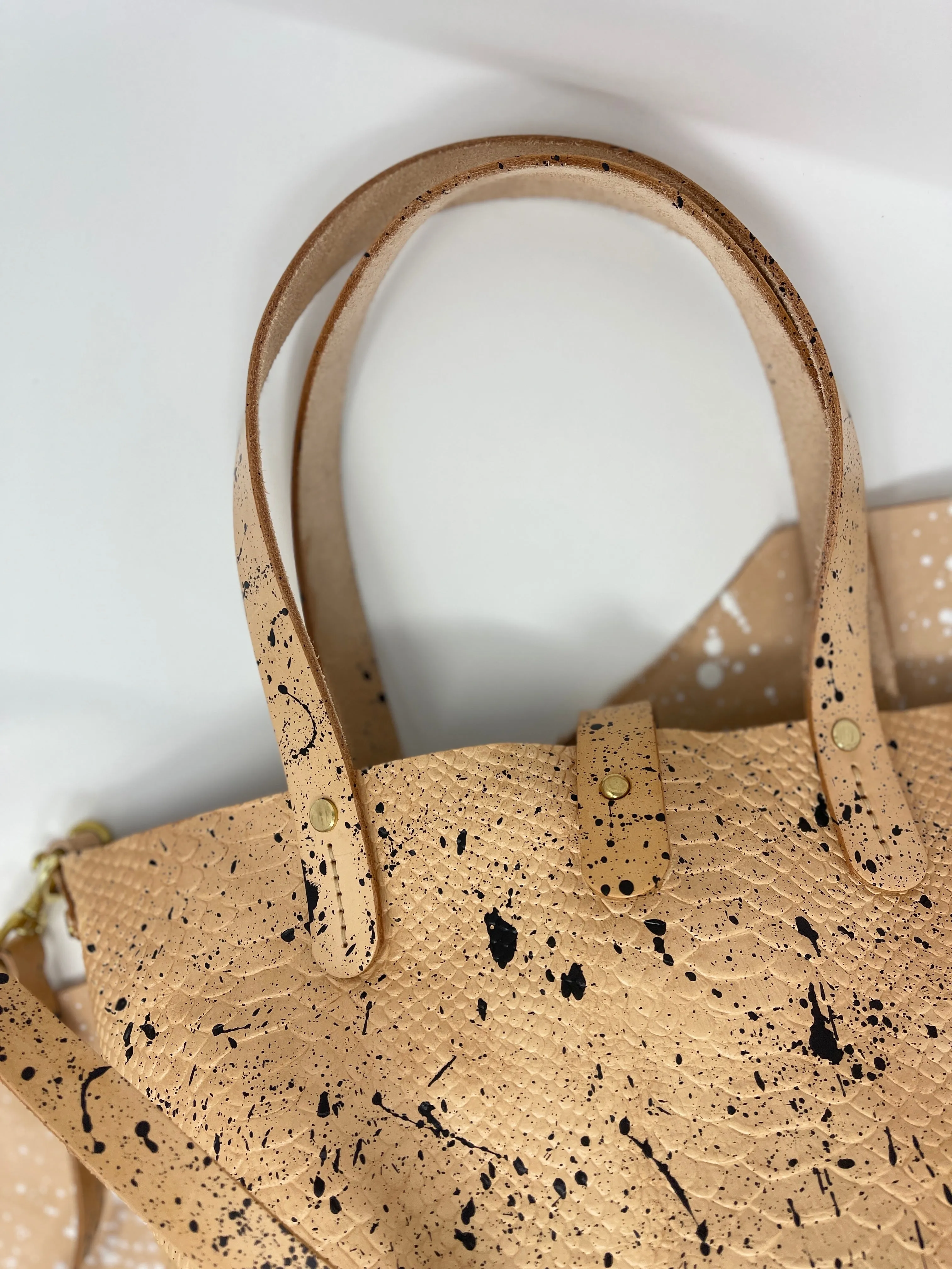 Black Splatter Veg Tan Leather Open Top Crossbody Tote