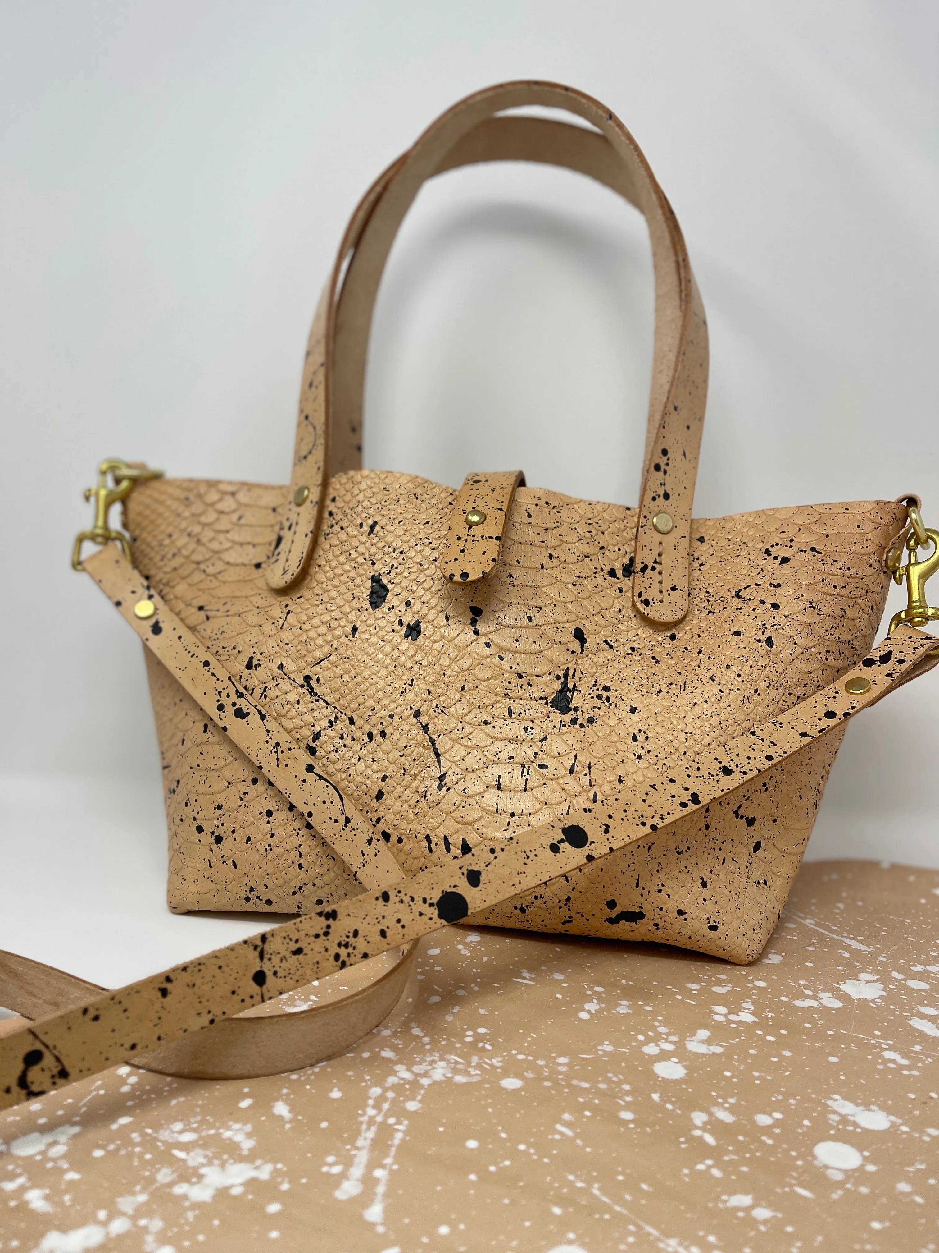 Black Splatter Veg Tan Leather Open Top Crossbody Tote