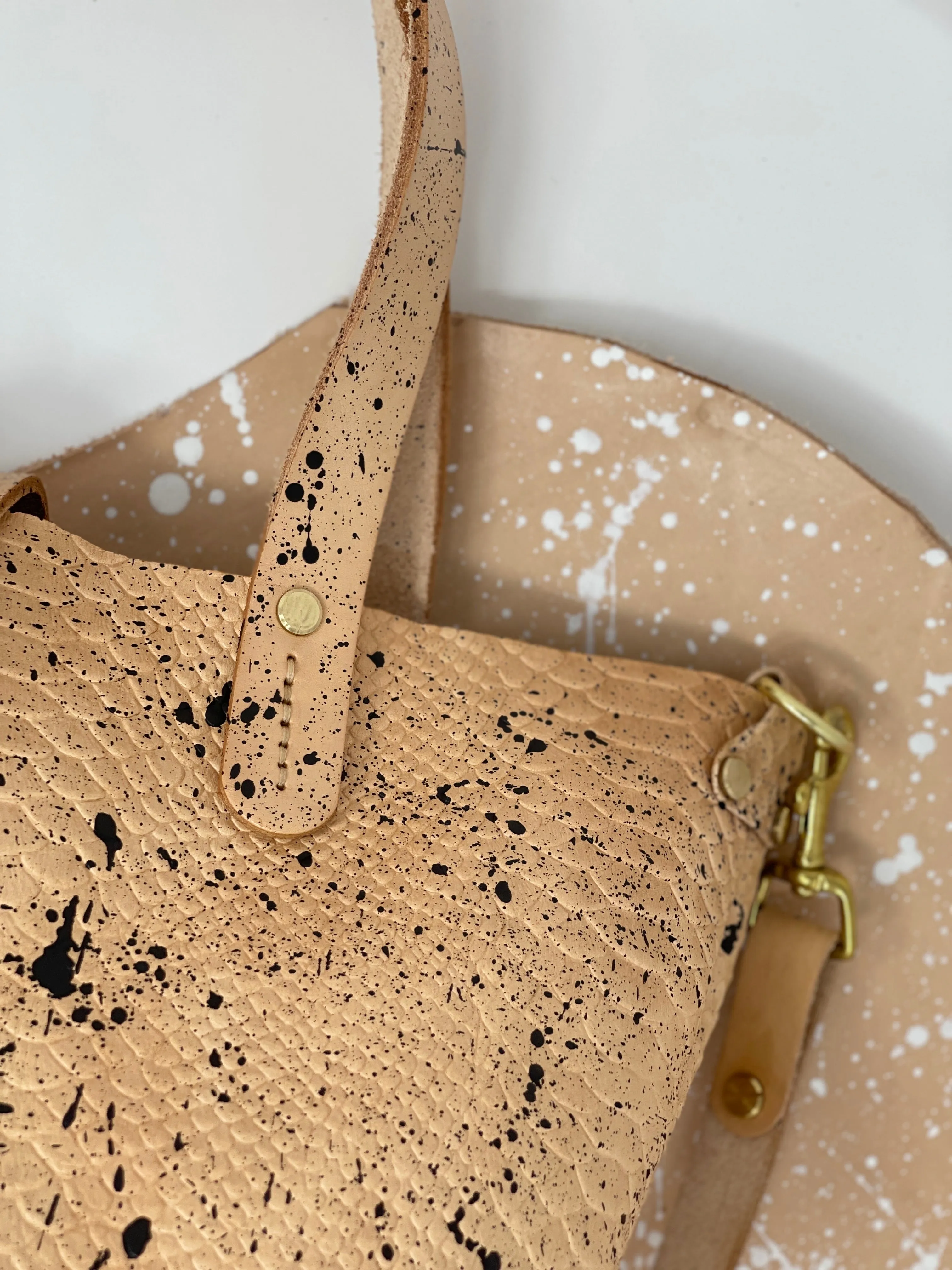 Black Splatter Veg Tan Leather Open Top Crossbody Tote