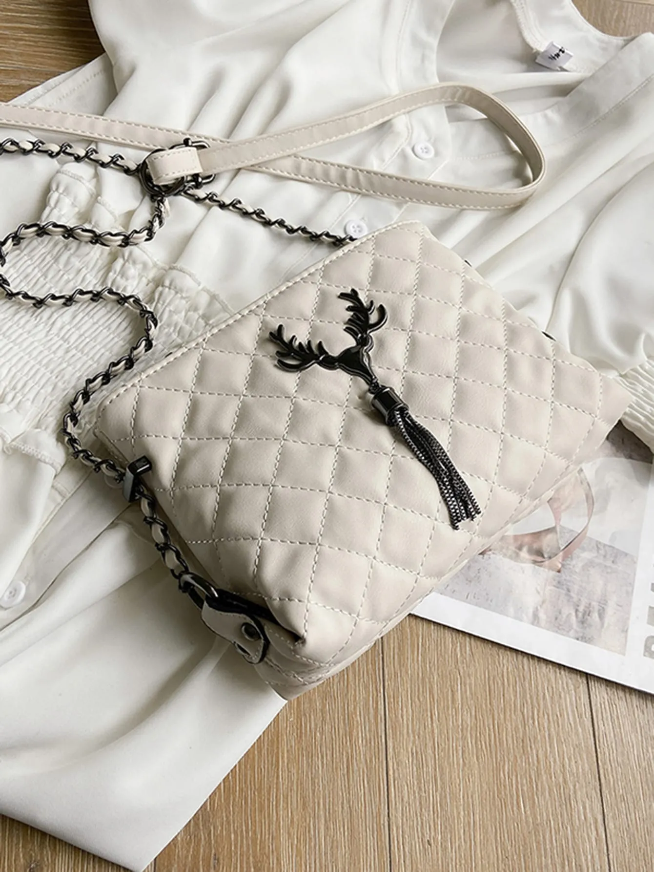 Tassel Charm Quilted Crossbody Bag